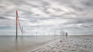 Langzeitbelichtung Nordseeinsel Baltrum bei wolkigem Himmel